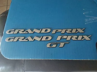 Pontiac Grand Prix GT  1997-06 LH Or RH Door Rear Trunk Lid Emblem Set Used OEM  • $27.95