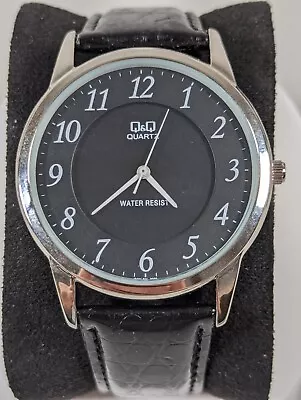 QQ Black Dial Round Silver Tone Case Black Faux Leather Band Watch • $20.99