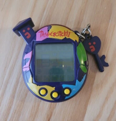 $170 • Buy Tamagotchi V5 2004  Cool  Dark Blue/rainbow