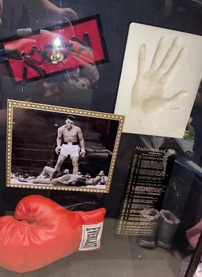 Signed Mohammed Ali Glove  • $4000