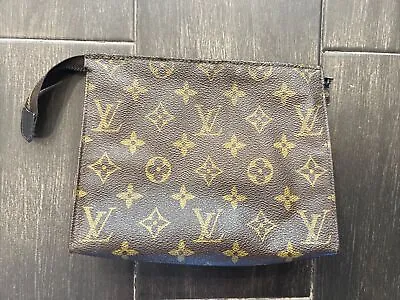 Louis Vuitton Monogram Bucket Pouch • $75