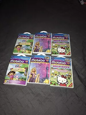 Lot Of 6 MobiGo Vtech Games -  Dora Tangled Minnie Hello Kitty Etc Nice Lot • $10