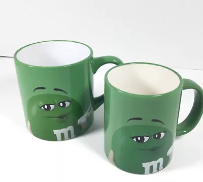 M&M’s Mug Lot Green 16 Oz And 12 Oz “Eat Your Heart Out” 2 Cups • $22.99