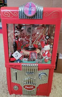 Enesco Coca-Cola Arcade Music Box Bank Combination.  • $199