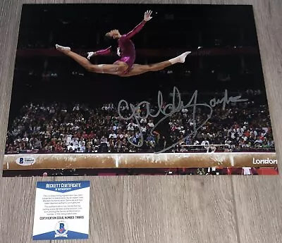 GABBY GABRIELLE DOUGLAS SIGNED USA GYMNASTICS 11x14 PHOTO WEXACT PROOF & BAS COA • $149.99