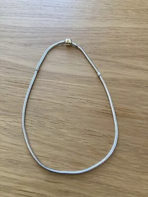 PANDORA 41cm SILVER BRACELET WITH GOLD CLASP • £70