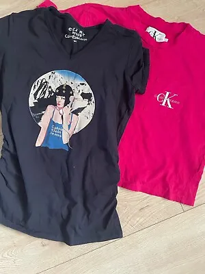 2 Woman’s Calvin Klein T-shirts. Size L. 1 Retro 90’s. 1 Pink Crop Boxy. • £5