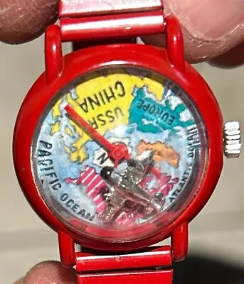 Out Of Time Airplane Flying Over World Map Bubble Watch Red Band Vintage Used • $23.17