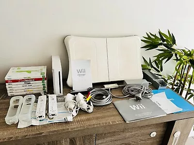 Nintendo Wii Console Bundle - Wii Fit Board X2 Remotes X2 Nunchucks X7 Games • $199.95