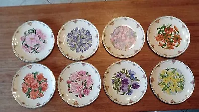 ROYAL ALBERT  PLATES QUEEN MOTHERS FAVOURITE FLOWERS Set Of 9 • £80