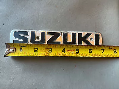 VINTAGE SUZUKI GAS TANK SIDE COVER EMBLEM - APPROX  7  1/8” Japan • $19.98