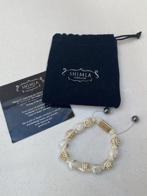 £10 • Buy White And Gold Himalayan Beaded Bracelet With Velvet Pouch