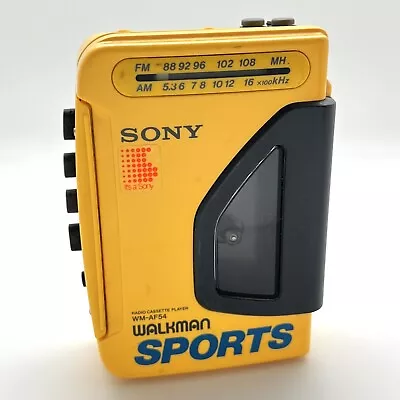 Sony WM-AF54 WALKMAN Sports Personal FM / AM Radio Cassette Player Yellow TESTED • $59.99