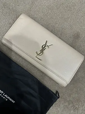 Authentic YSL Clutch • $900