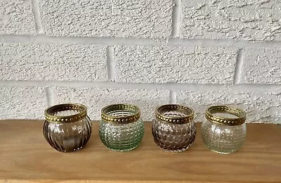 4 Coloured Glass Tea Light Holders • £4