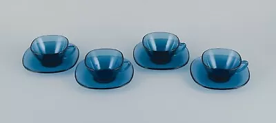 Vereco France A Set Of Four Teacups And Matching Saucers In Blue Glass. • $200