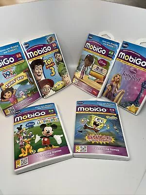 Vtech MobiGo 6 Video Game Lot Mickey SpongeBob Doc Mcstuffins Dora Disney. EUC • $30