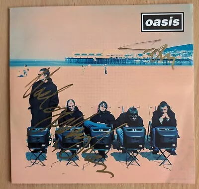 Hand Signed / Autographed OASIS (Liam & Noel Gallagher) 7  Vinyl 'Roll With It'  • £56