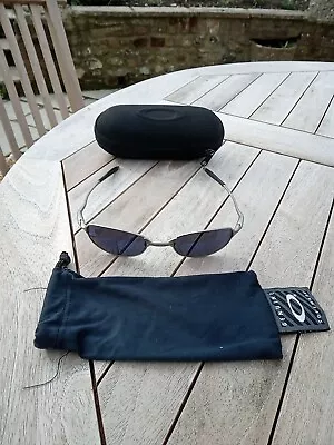 Oakley Wire Sunglasses With Oakley Vault And Bag • £32