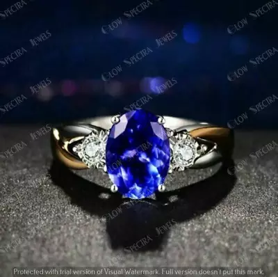 2 Ct Oval Simulated Tanzanite Three Stone Engagement Ring 14K White Gold Plated • $110.30