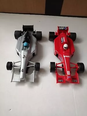 SCALEXTRIC Hornby Firestone Firehawk Silver F1 + Team Rapid Minolta 8 Red.  • £12