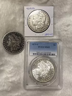 Morgan Silver Dollar Lot Of 3.    1893 CC - / 1879 S -MS65 / 1884 S • $600