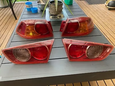 Mitsubishi Lancer CJ CF 2007 ON Tail Lights Boot Lid Lights X4 VGC • $99.50