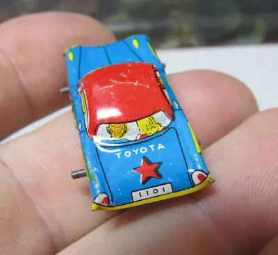 Vintage Tin Toy Car Japan Blue Tin Lithograph Mini Toyota Wheels Roll NEW • $7.99