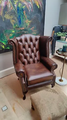 Brown Leather Armchair • £399