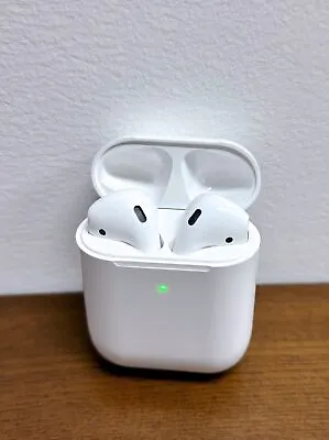 Apple AirPods 2nd Generation With Earphone Earbuds & Wireless Charging Box. • $31.68