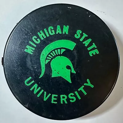 1980s Michigan State Spartans Hockey Puck • $9.99