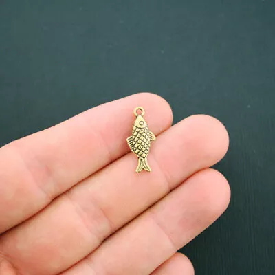 8 Fish Charms Antique Gold Tone 2 Sided - GC829 • $4.99