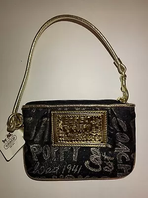 Coach Poppy Story Patch Black Gold Wristlet 44070 New. • $44.99