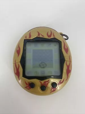 Vintage 2004 Wiz Tamagotchi Connection V2 Gold Red Flames Working Rare • $98.89