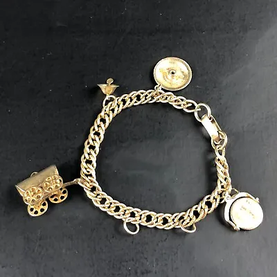 Vintage Charm Bracelet W Charms Wagon Compass Bell I LOVE YOU Spinner Gold Tone • $26.91