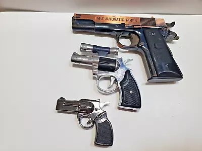 LOT OF 3 VINTAGE Gun. Pistol Revolver LIGHTERS  Collect / Fix / Display  6573/8 • $34.77