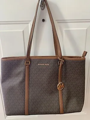 Michael Kors Handbag - 17x13 - Brown Leather With Logo And Bag Charm. • $42