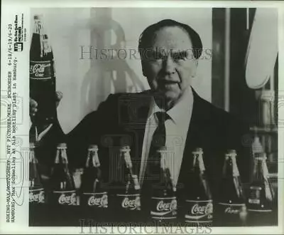 1988 Press Photo Max Schmeling Holds Up Coca-Cola Bottle At His Hamburg Plant • $16.99