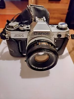 Canon AE-1 35mm SLR Film Camera + FD 50mm F/1.8 Prime Lens + Strap + Cap • £175