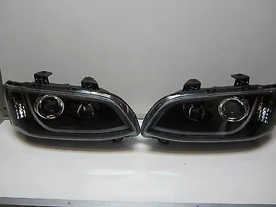 $619 • Buy Holden Commodore VE SERIES 1 BLACK LED DRL Projector Headlights Pair New