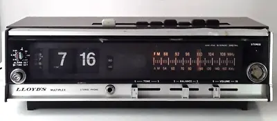 $55 • Buy ***** WORKING Vintage Lloyd’s AM/FM Stereo Flip Number Clock Radio Model JJ-6277