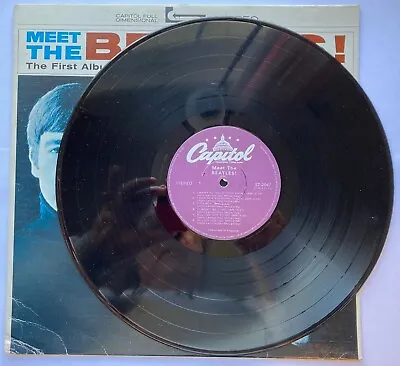The Beatles Meet The Beatles Stereo LP (Canada Purple Capitol 1980) M- • $48.95