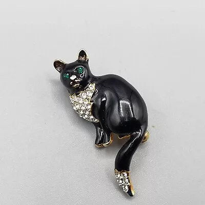 Vintage Black Enamel & Rhinestone Cat Brooch Pin Green RS Eyes Sitting Kitty • $14.49