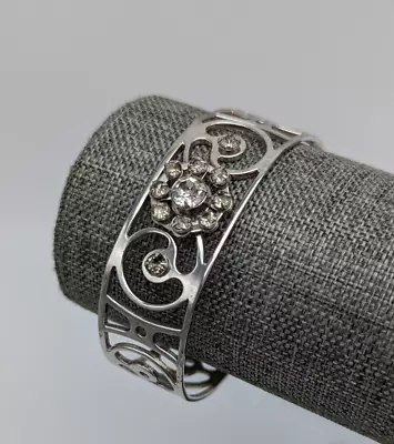 Vintage Silver Tone Swirling Cut Out Glass Rhinestone Flower Cuff Bracelet • $4.99