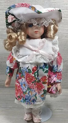 Vintage Porcelain Girl Doll With Hat Blond Hair Blue Eyes Lace Flower Dress 11in • $7.50