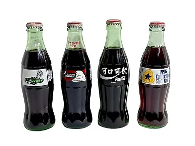 Four Collectible Unopened Coca Cola Bottles Lot Of 4 Different Bottle 8oz • $30