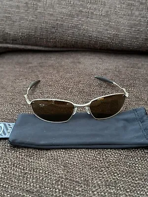 Oakley Whisker Sunglasses. • £80