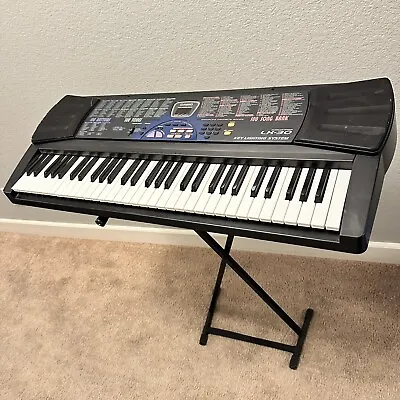 Casio Electric Portable Keyboard LK-30 Great Tones Song Bank With Portable Stand • $158