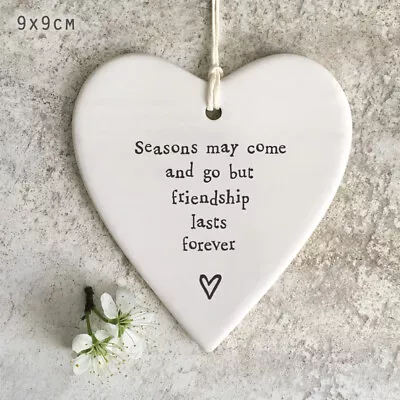 East Of India Porcelain White Heart - SEASONS MAY COME AND GO BUT FRIENDSHIP • £6.49