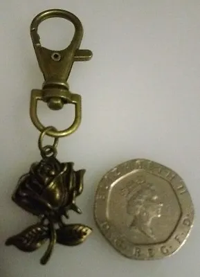 £3 • Buy Disney Beauty And The Beast Rose Clip On Bag Charm. Bronze. Valentines Gift .
